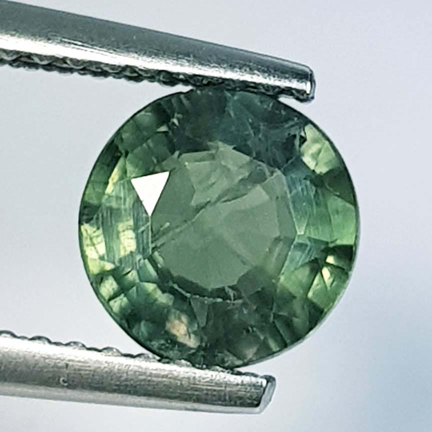 1.53 ct Natural Green Sapphire: No Reserve! Title: 1.53 ct Natural Green Sapphire Color/Clarity: Loosegemstone Gemstones: VS Carat Weights: 1.53 Size/Dimensions: 7.00 x 7.00 x 3.50 Additional Information: Round - Burma Shipping: D