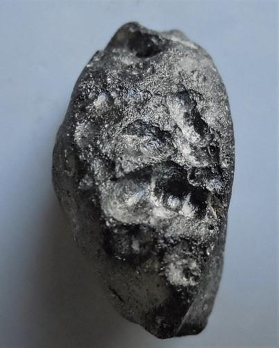 PHILIPPINITE TEKTITE - FROM METEORITE IMPACT: Title: PHILIPPINITE TEKTITE - FROM METEORITE IMPACT Origin: Paracale, Camarines Norte, Luzon, Philippines Size: 3x2x1.5 cm / 21 gram Description: irregular shaped rizalite/philippinite tektite with sm