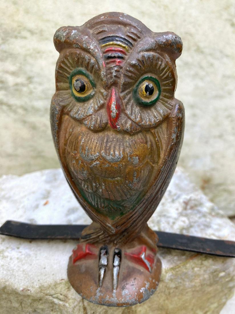 Early 20thc cast aluminum owl doorstop in original (1 of 5)