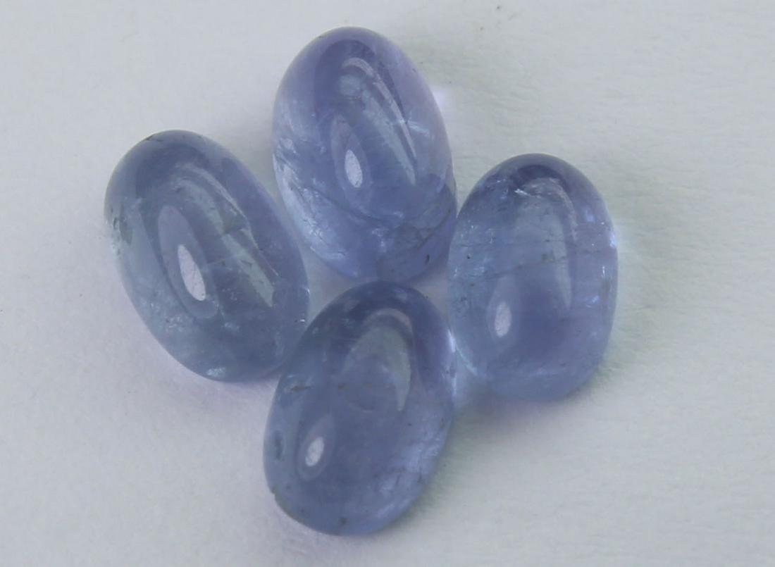 2.29 cts Natural Tanzanite Lot: No Reserve! Title: 2.29 cts Natural Tanzanite Lot Additional Information: Gemstone : Natural Tanzanite Shape and cut : Oval cabochan Weight : 2.29 Carats Measurements : 5.42x3.61x2.74 mm, 5.83x3.70x2.