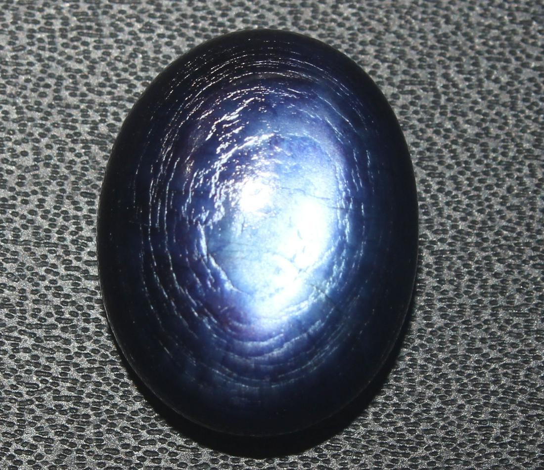 11.66 cts Natural Moonstone: No Reserve! Title: 11.66 cts Natural Moonstone Additional Information: Gemstone : Natural Moonstone Shape : Oval cabochan Weight : 11.66 Carats Measurements : 16.85x13.14x6.90 mm Color : Purple Transp