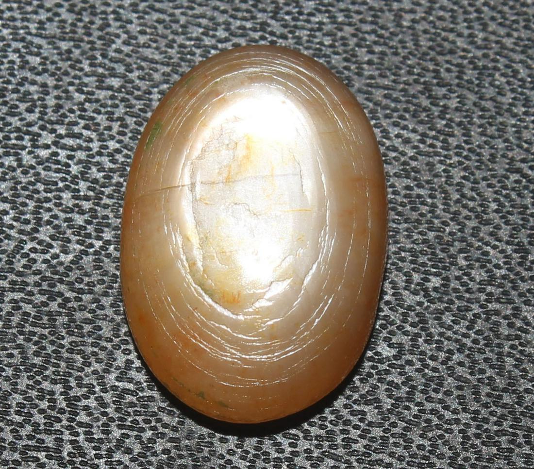 5.98 cts Natural Moonstone: No Reserve! Title: 5.98 cts Natural Moonstone Additional Information: Gemstone : Natural Moonstone Shape : Oval cabochan Weight : 5.98 Carats Measurements : 15.03x10.43x5.10 mm Color : Light yellow Tr