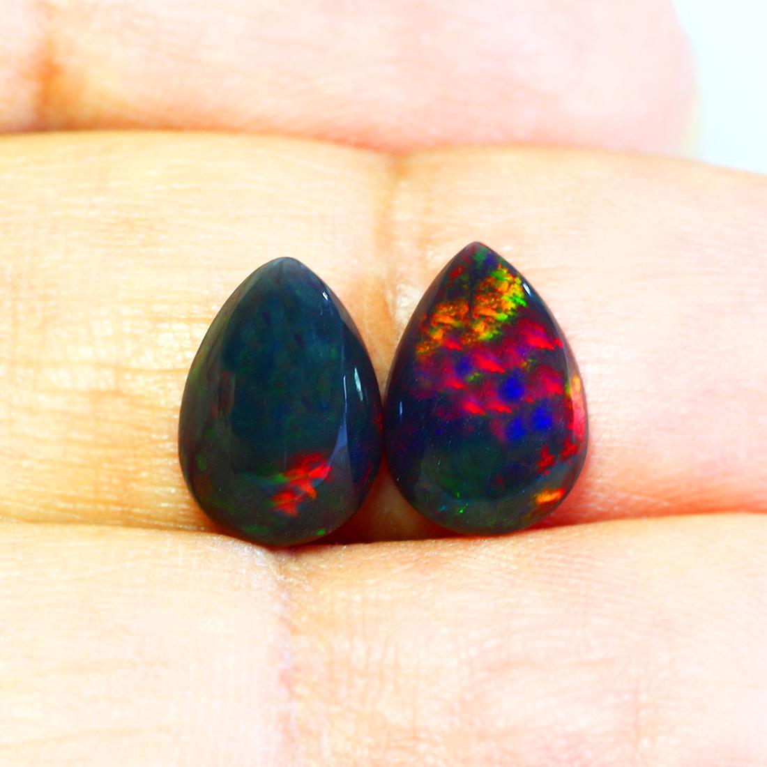2.26Ct Pear cut 10 X 7 mm Multi color Flashing Black (1 of 1)