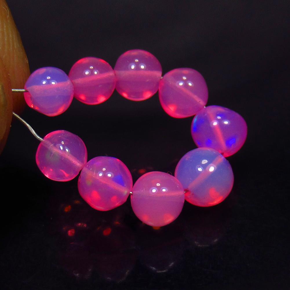 5.25 Ctw Natural 9 Drilled Pink Fire Opal Beads: No Reserve! Title: 5.25 Ctw Natural 9 Drilled Pink Fire Opal Beads Stone Clarity: Transparent Gemstone: Opal Beads Carat Weight: 5.25 Dimesnions: 4.70 to 5.70 mm / 9 PC's Additional Information: Drill