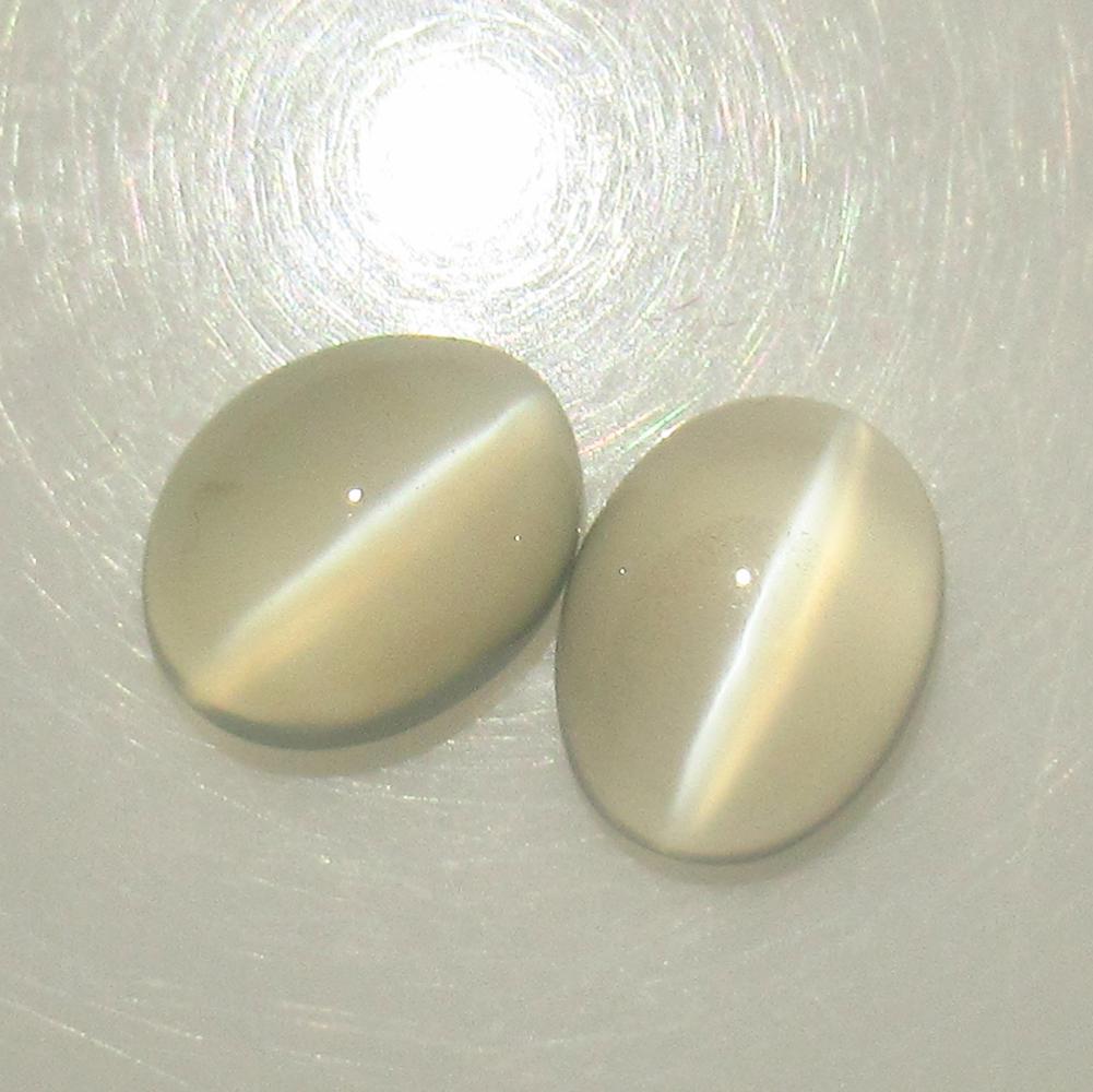 3.98 Ctw Natural Moonstone Oval Pair: No Reserve! Title: 3.98 Ctw Natural Moonstone Oval Pair Stone Clarity: Semi-Transparent Gemstone: Moonstone Carat Weight: 3.98 Dimesnions: 9.10 x 7.20 x 4.40 mm / 2 Pc's Additional Information: Nice O