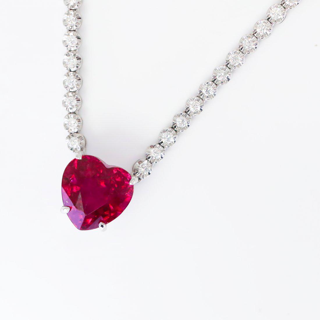 Rubelite Heart and Diamond Necklace: Title: Rubelite Heart and Diamond Necklace Additional Information: Heart 2 carat Rubelite Necklace with 2.10 carats of diamonds on 18k white gold necklace Reserve: $4,000.00 Shipping: Domestic: Free s