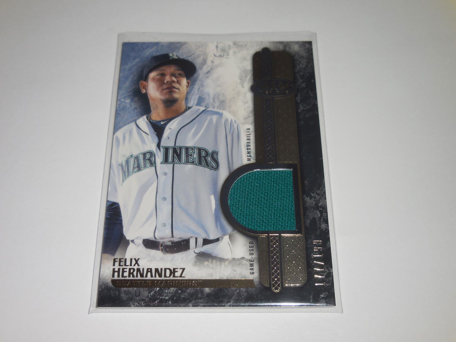 2016 TOPPS TIER ONE FELIX HERNANDEZ GAME USED JERSEY (1 of 2)