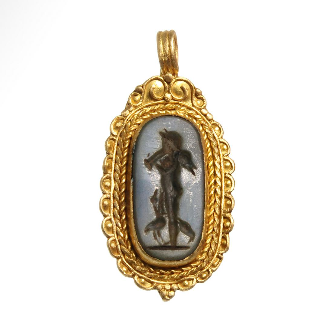 Roman Gold Pendant with Onyx Nicolo Intaglio with Pan: Title: Roman Gold Pendant with Onyx Nicolo Intaglio with Pan Date/Origin: Roman, 2nd Century A.D. Description: The white and black onyx nicolo intaglio engraved with the figure of satyr Pan, standing 