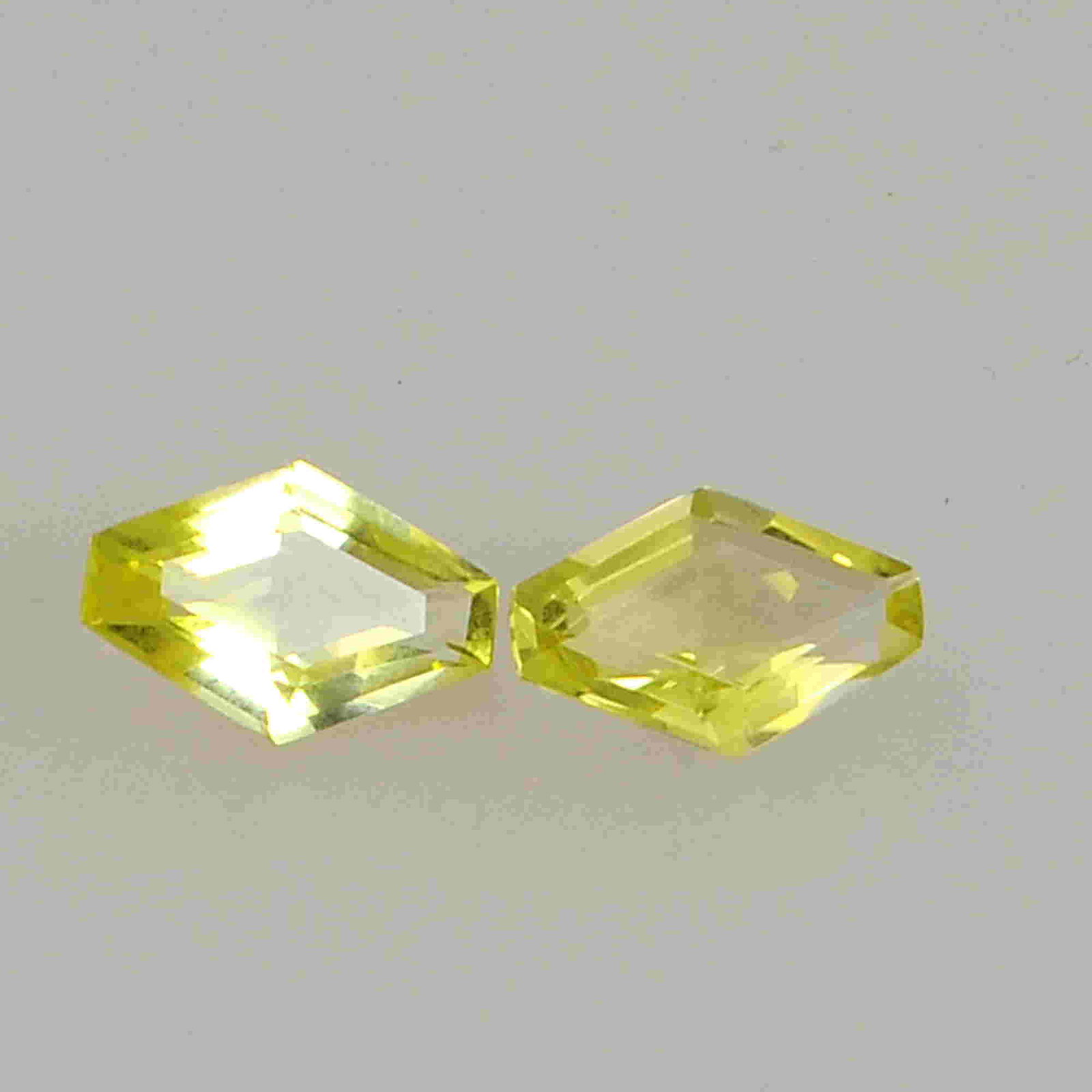 3.90 Carat Yellow Color Natural Fancy Lemon Quartz: No Reserve! Title: 3.90 Carat Yellow Color Natural Fancy Lemon Quartz Loose Gemstone 2 Pieces Additional Information: Specification of Gemstone Stone : Lemon Quartz Shape : Fancy Size : 4.5H x 12L x 8