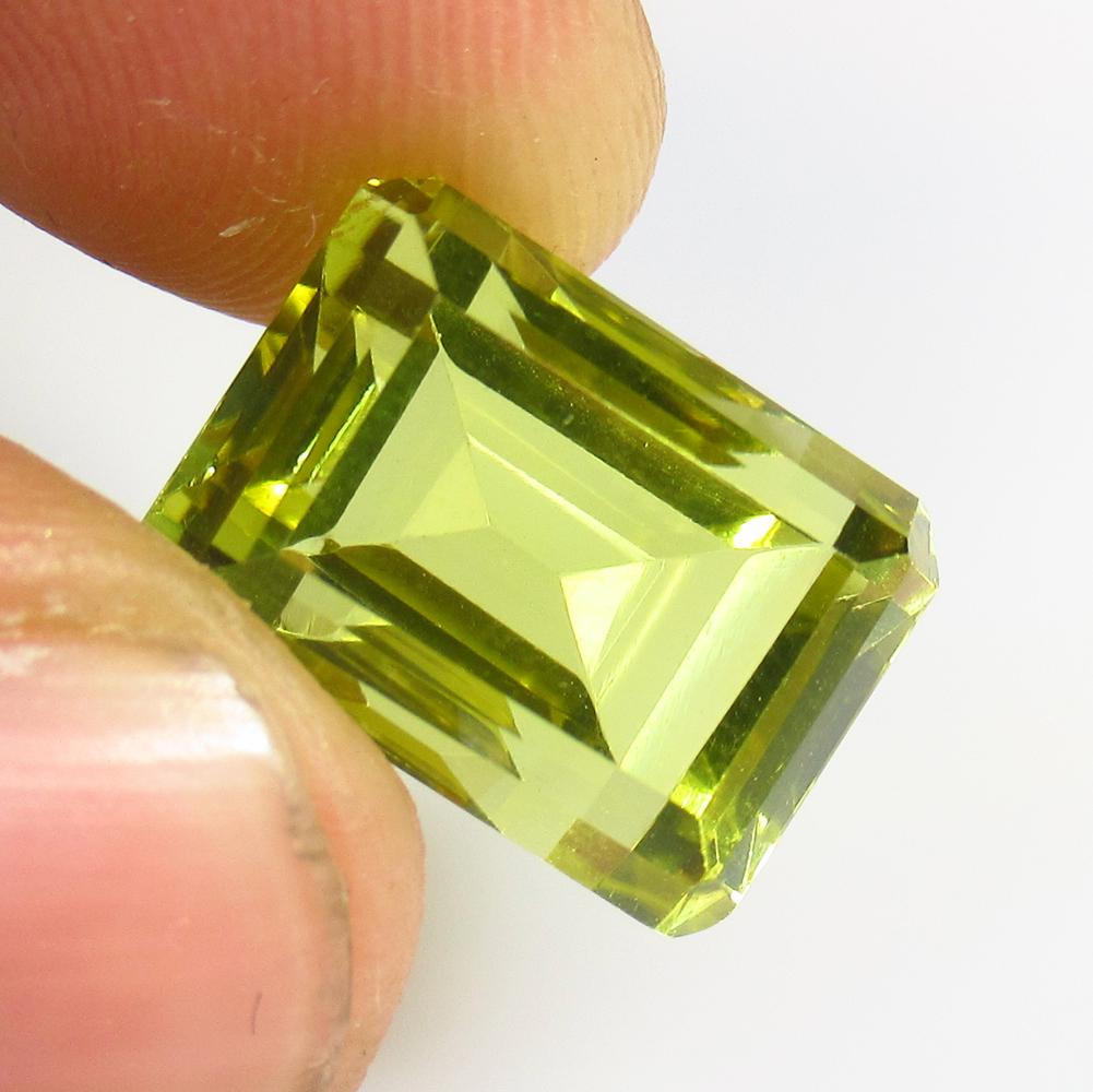 11.31 Ct Natural Lemon Quartz Octagon Cut: No Reserve! Title: 11.31 Ct Natural Lemon Quartz Octagon Cut Stone Clarity: VVS Gemstone: Natural Lemon Quartz Carat Weight: 11.31 Size/Dimensions: 14.00 x 10.10 x 10.00 mm Additional Information: Goo