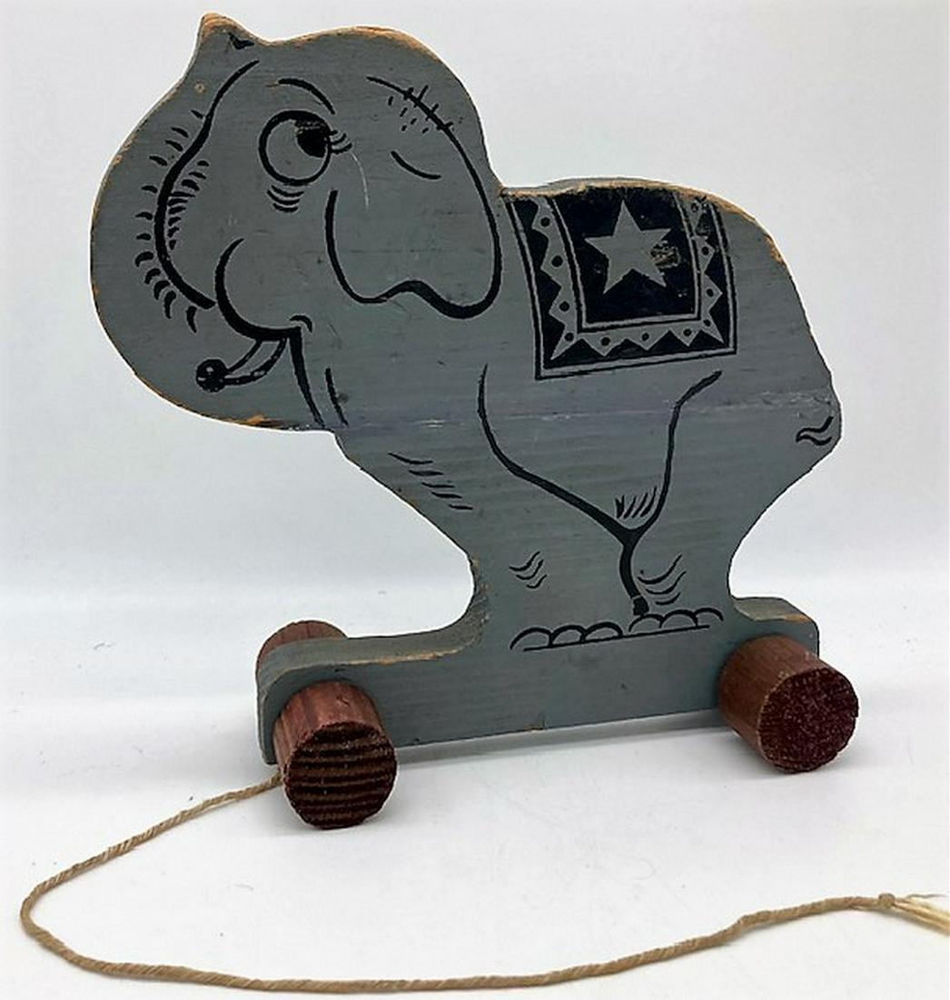 Vintage 1950's Kadee Pull Toy Elephant: Title: Vintage 1950's Kadee Pull Toy Elephant Date/Period: APPROX 1950'S Dimension: Approx 9 x 9 Material: Wood Additional Information: VINTAGE 1950'S KADEE PULL TOY ELEPHANT Shipping: Domestic: Flat-