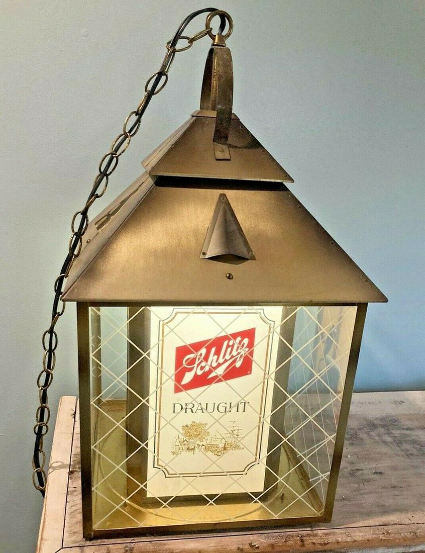 Incredible Huge 1960's Schlitz Beer Hanging Light: Title: Incredible Huge 1960's Schlitz Beer Hanging Light Advertising Date/Period: 1960's Dimension: Approx 25" tall, bottom diameter 13.5 X 13.5 Material: Matal, glass Additional Information: This adv