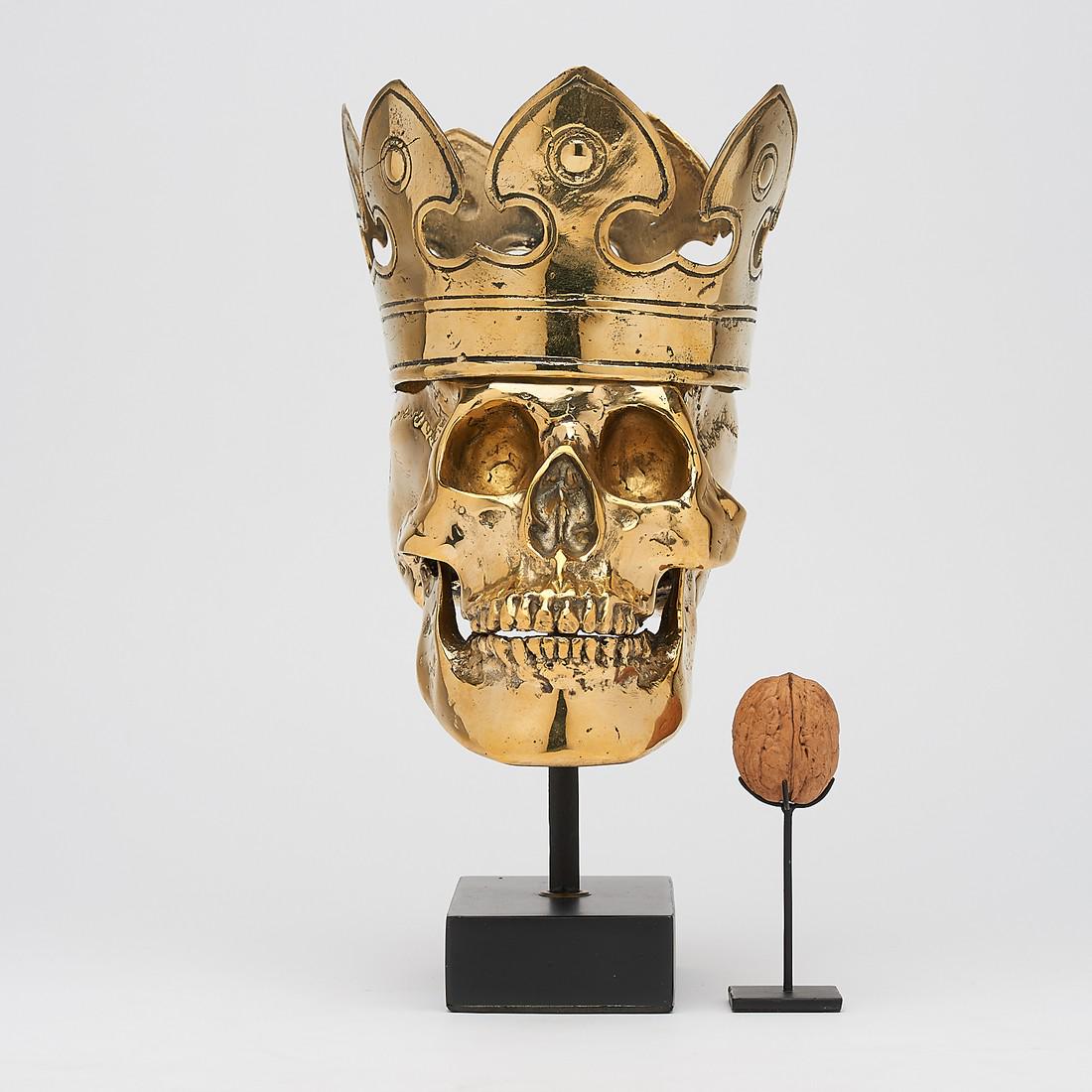 Human Skull Royal King Henry: Title: Human Skull Royal King Henry Maker: Unknown Origin: Indonesia Date/Period: 2020 Materials: Bronze, Wood Dimensions:Height: 30 cm, 12 inches, Width 16 cm 6 Inches. Length 16 cm 6 inches Descript