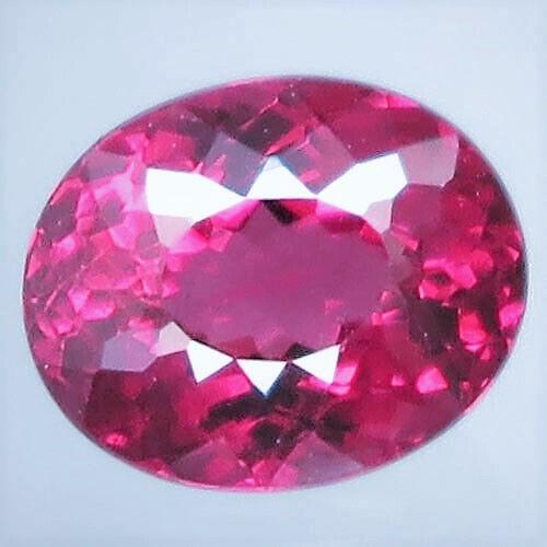 1.46 Ct. Natural Oval Orangish Pink Rhodolite Garnet (1 of 3)