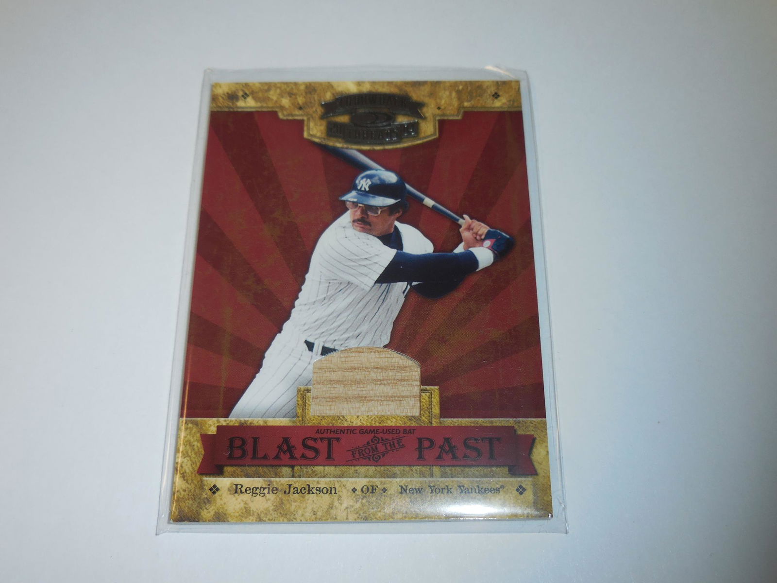 2004 DONRUSS THREADS REGGIE JACKSON GAME USED BAT CARD (1 of 2)