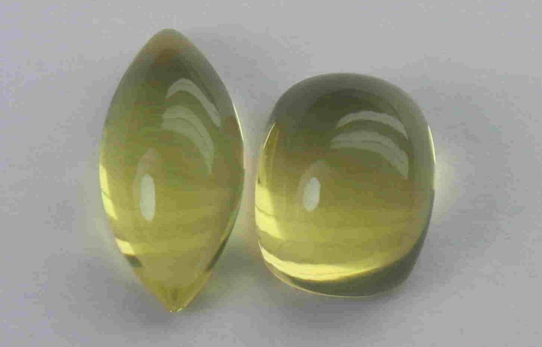4.18 Cts Natural Lemon Quartz Lot: No Reserve! Title: 4.18 Cts Natural Lemon Quartz Lot Additional Information: Gemstone : Natural Lemon Quartz Weight : 4.18 Carats Dimensions : 11.24x5.56x4.30 mm , 8.65x6.86x5.22 mm Shape : Rectangula