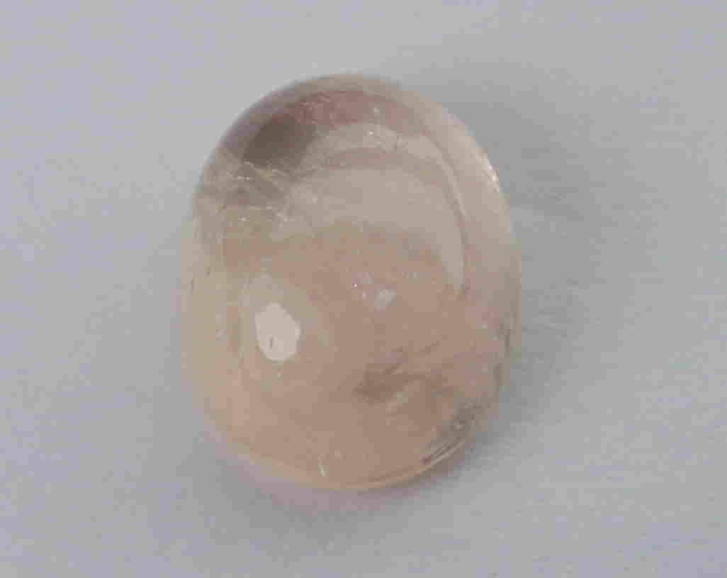 1.24 Natural Morganite: No Reserve! Title: 1.24 Natural Morganite Additional Information: Gemstone : Natural Morganite Shape and cut : Oval cabochan Weight : 1.24 Carats Measurements : 7.77x5.94x3.44 mm Color : Peach Transpr
