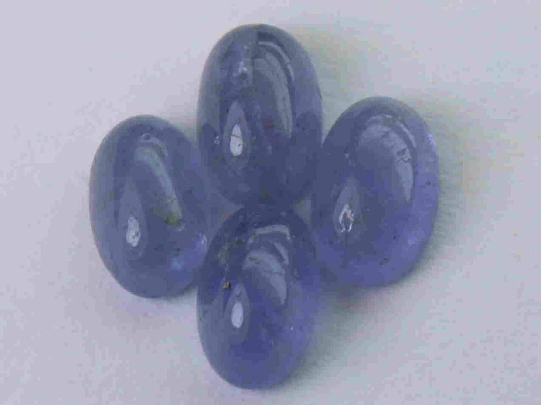 2.21 cts Natural Tanzanite Lot: No Reserve! Title: 2.21 cts Natural Tanzanite Lot Additional Information: Gemstone : Natural Tanzanite Shape and cut : Oval cabochan Weight : 2.21 Carats Measurements : 5.55x3.75x2.81 mm, 5.85x3.77x2.
