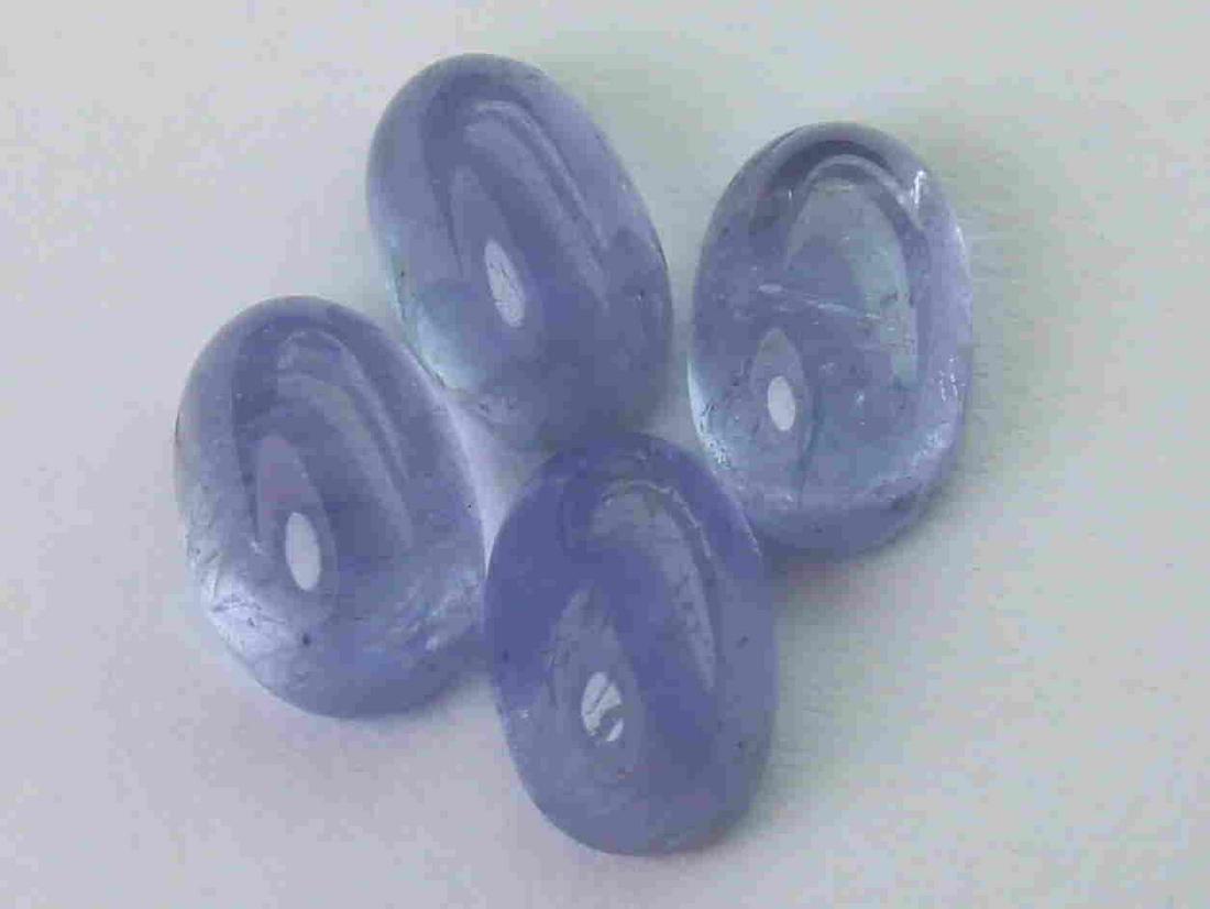 2.24 cts Natural Tanzanite Lot: No Reserve! Title: 2.24 cts Natural Tanzanite Lot Additional Information: Gemstone : Natural Tanzanite Shape and cut : Oval cabochan Weight : 2.24 Carats Measurements : 5.69x3.55x2.71 mm, 5.90x3.75x2.