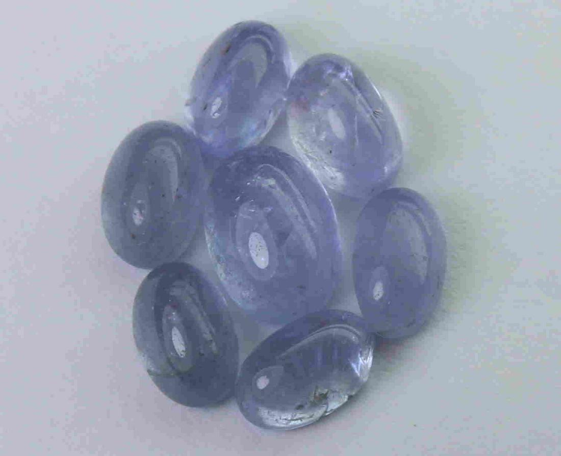 4.33 cts Natural Tanzanite Lot: No Reserve! Title: 4.33 cts Natural Tanzanite Lot Additional Information: Gemstone : Natural Tanzanite Shape and cut : Oval cabochan Weight : 4.33 Carats Measurements : 6.97x4.88x3.33 mm, 5.60x3.55x2.