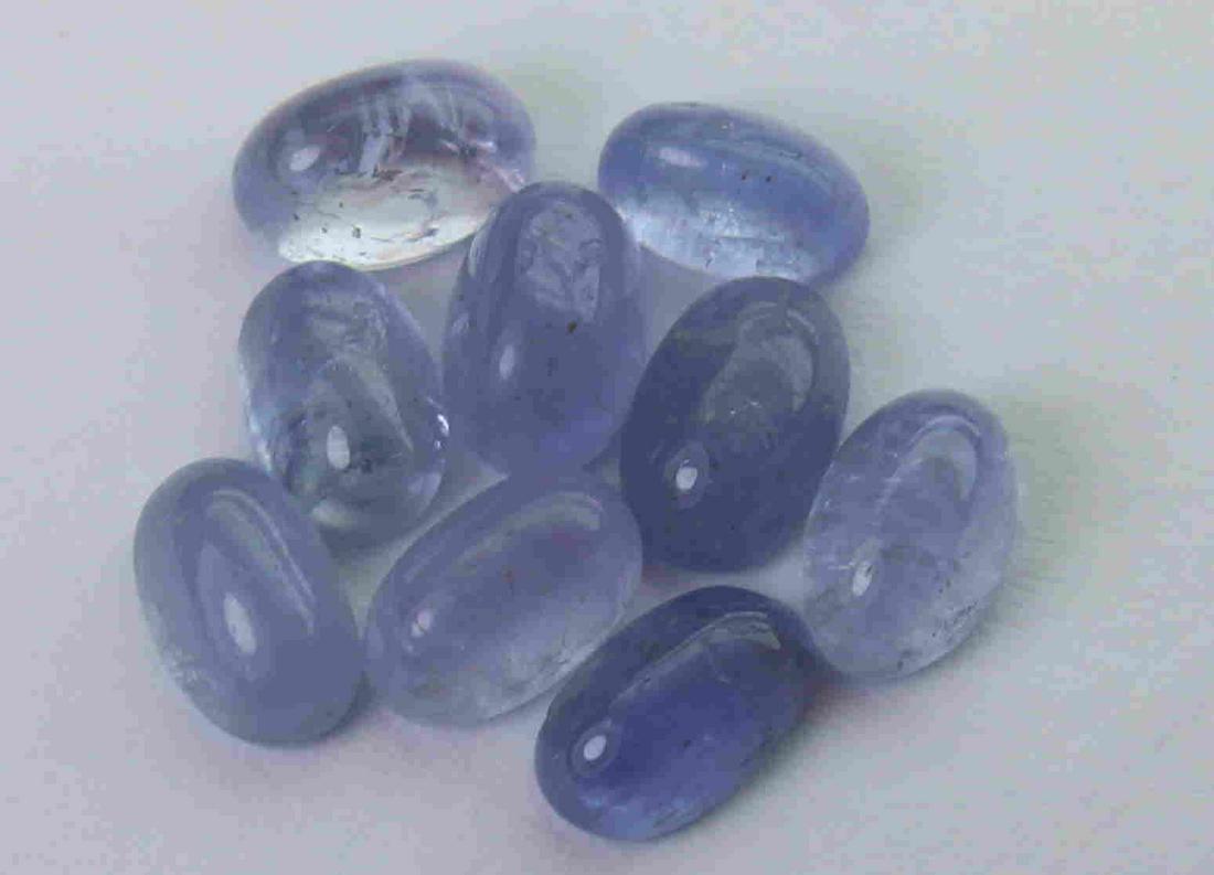 4.80 cts Natural Tanzanite Lot: No Reserve! Title: 4.80 cts Natural Tanzanite Lot Additional Information: Gemstone : Natural Tanzanite Shape and cut : Oval cabochan Weight : 4.29 Carats Measurements : 6x3.83x2.50 mm, 5.20x3.25x2.65 