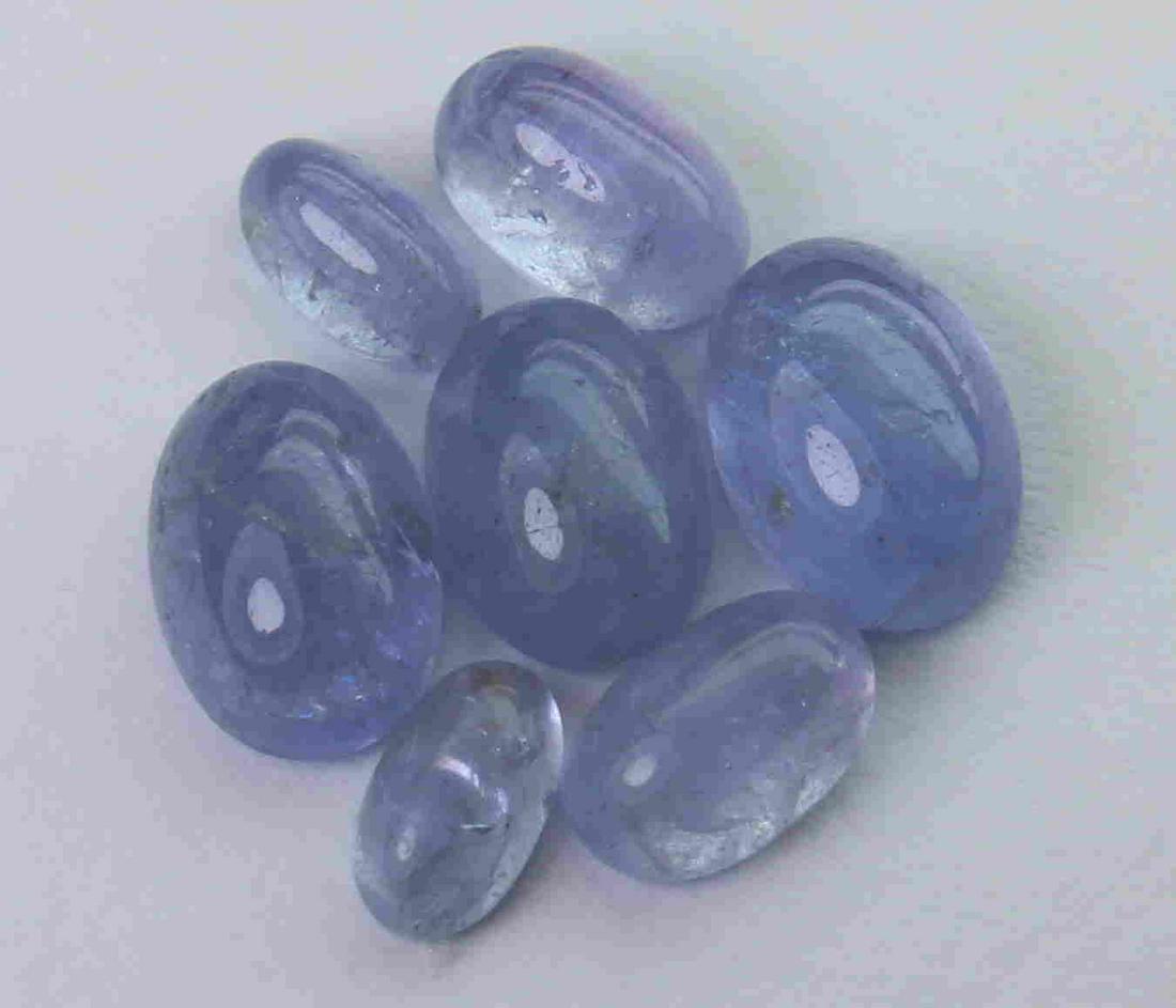 4.44 cts Natural Tanzanite Lot: No Reserve! Title: 4.44 cts Natural Tanzanite Lot Additional Information: Gemstone : Natural Tanzanite Shape and cut : Oval cabochan Weight : 4.44 Carats Measurements : 6.95x4.84x2.92mm , 4.82x2.80x2.