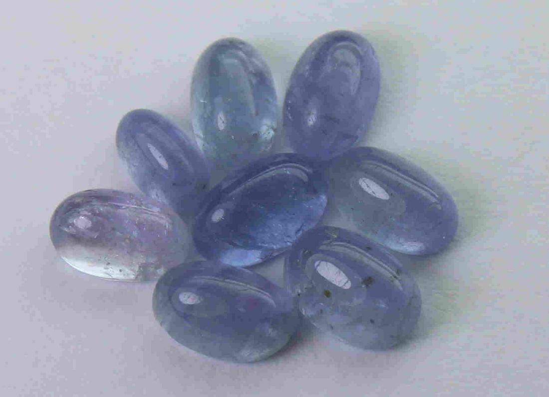 4.22 cts Natural Tanzanite Lot: No Reserve! Title: 4.22 cts Natural Tanzanite Lot Additional Information: Gemstone : Natural Tanzanite Shape and cut : Oval cabochan Weight : 4.22 Carats Measurements : 5.97x4/04x2.97 mm 9.91x2.78x2.4