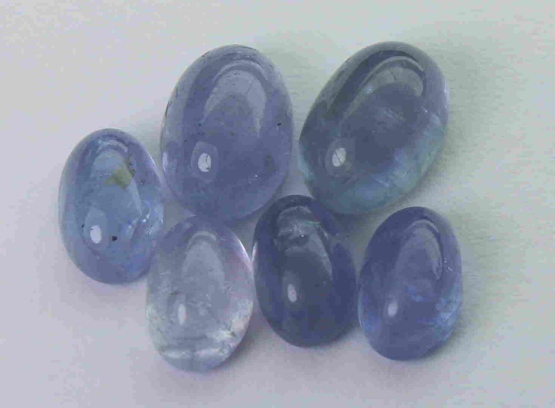 4.31 cts Natural Tanzanite Lot: No Reserve! Title: 4.31 cts Natural Tanzanite Lot Additional Information: Gemstone : Natural Tanzanite Shape and cut : Oval cabochan Weight : 4.31 Carats Measurements : 6.88x4.80x3.52 mm 5.66x3.52x2.7