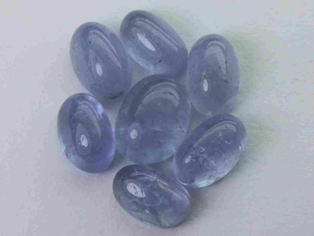 4.21 cts Natural Tanzanite Lot: No Reserve! Title: 4.21 cts Natural Tanzanite Lot Additional Information: Gemstone : Natural Tanzanite Shape and cut : Oval cabochan Weight : 4.21 Carats Measurements : 6.73x4.78x3.21 mm , 5.49x3.45x2