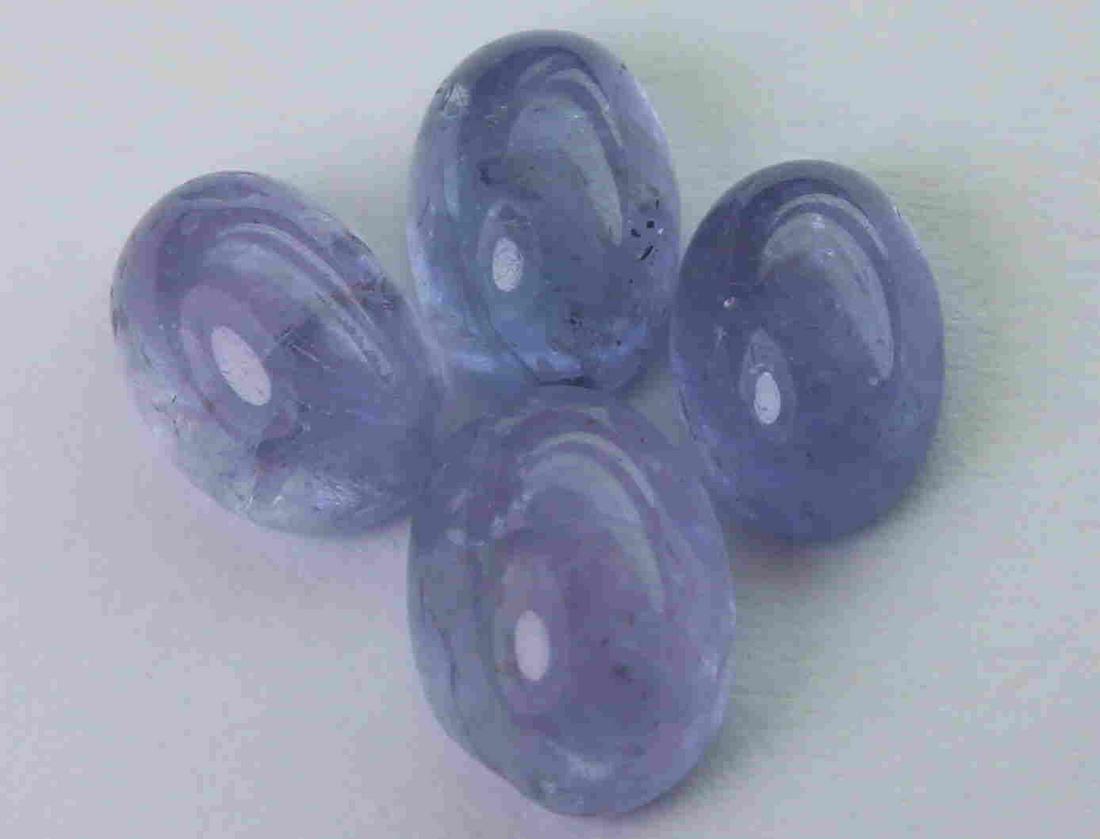 4.58 cts Natural Tanzanite Lot: No Reserve! Title: 4.58 cts Natural Tanzanite Lot Additional Information: Gemstone : Natural Tanzanite Shape and cut : Oval cabochan Weight : 4.58 Carats Measurements : 7.60x5.46x3.87 mm , 6.70x4.66x3