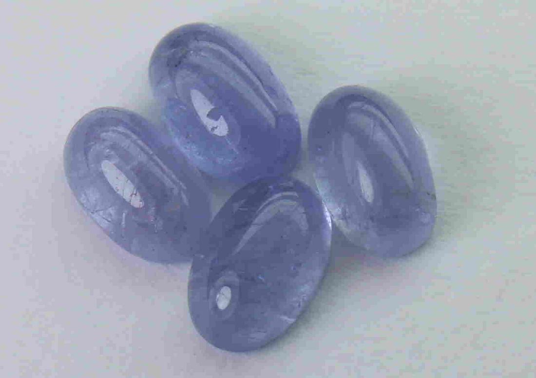 2.20 cts Natural Tanzanite Lot: No Reserve! Title: 2.20 cts Natural Tanzanite Lot Additional Information: Gemstone : Natural Tanzanite Shape and cut : Oval cabochan Weight : 2.20 Carats Measurements : 5.65x3.63x2.60 mm, 6.00x3.90x2.