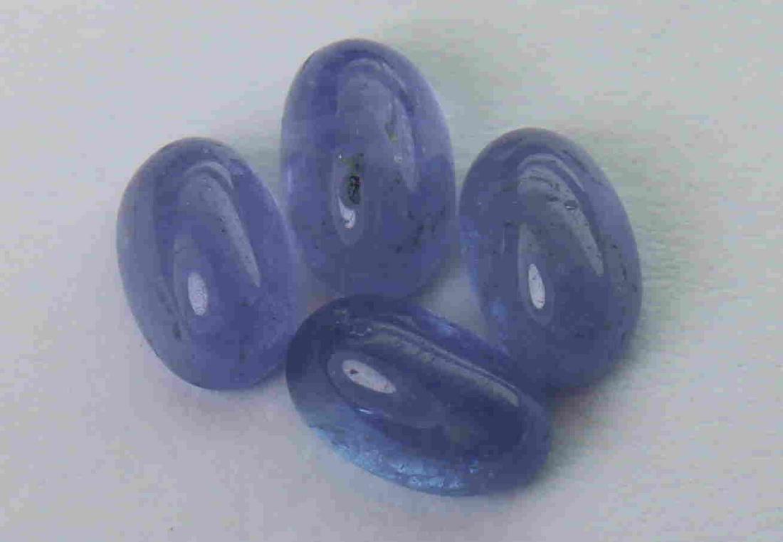 2.15 cts Natural Tanzanite Lot: No Reserve! Title: 2.15 cts Natural Tanzanite Lot Additional Information: Gemstone : Natural Tanzanite Shape and cut : Oval cabochan Weight : 2.15 Carats Measurements : 5.67x3.70x2.60 mm, 5.90x3.79x2.