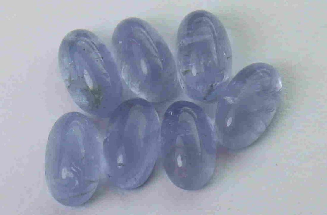 2.01 cts Natural Tanzanite Lot: No Reserve! Title: 2.01 cts Natural Tanzanite Lot Additional Information: Gemstone : Natural Tanzanite Shape and cut : Oval cabochan Weight : 2.01 Carats Measurements : 5x3 mm Number of Stone : 4 Colo