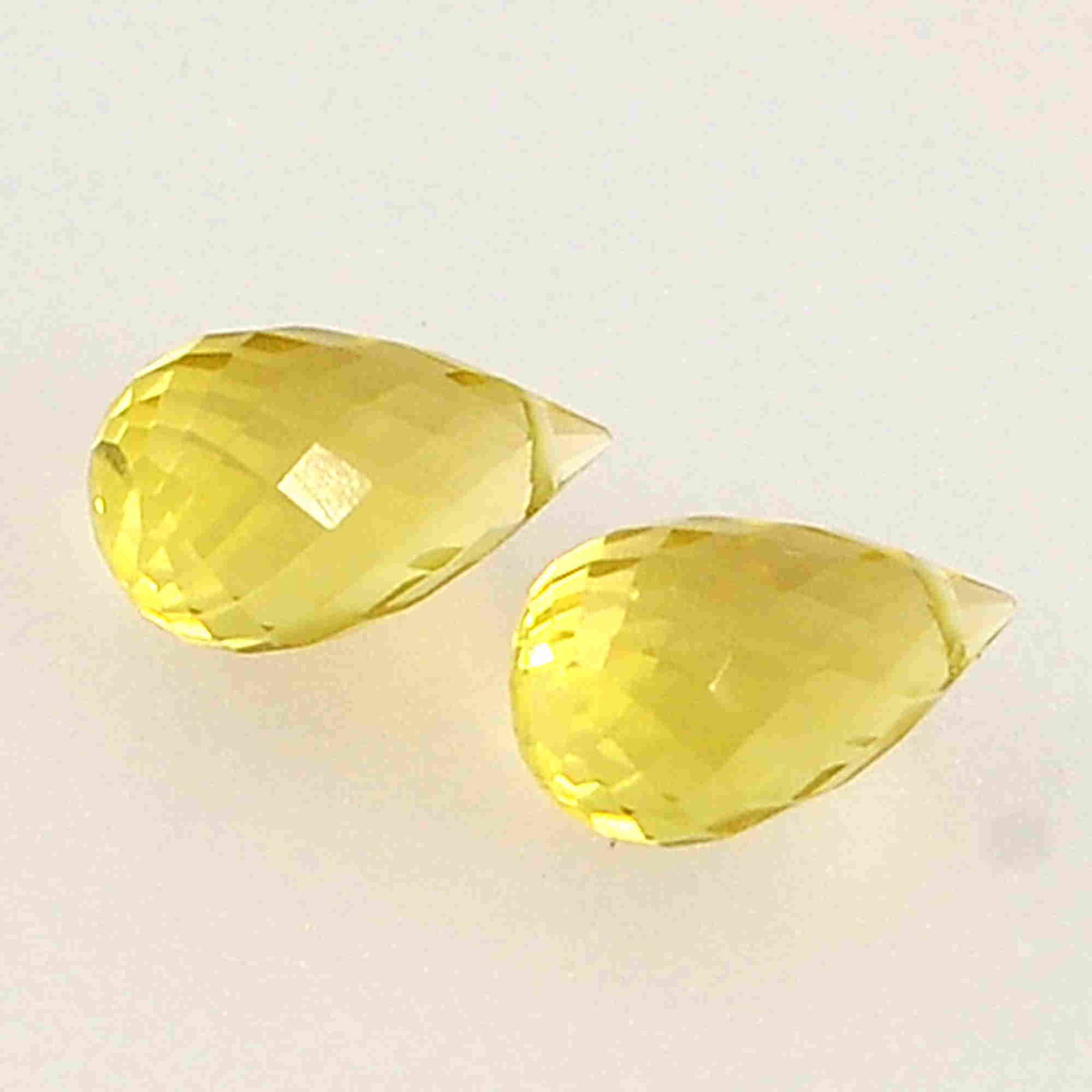 5.4 Carat Yellow Color Natural Drops Lemon Quartz Loose: No Reserve! Title: 5.4 Carat Yellow Color Natural Drops Lemon Quartz Loose Gemstone 2 Pieces Brand: Gems Trading Center Gemstones: Lemon Quartz Carat Weights: 5.4 Size/Dimensions: 6.5H x 11L x 6.5W mm
