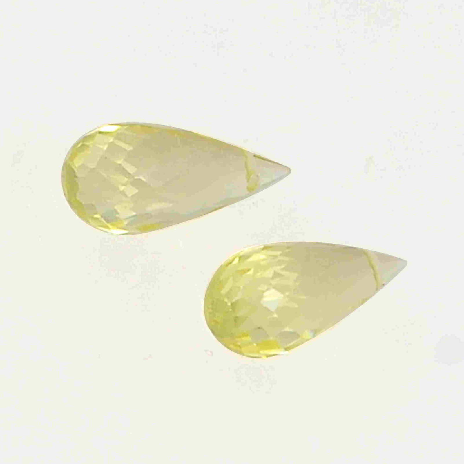 4.5 Carat Yellow Color Natural Drops Lemon Quartz Loose: No Reserve! Title: 4.5 Carat Yellow Color Natural Drops Lemon Quartz Loose Gemstone 2 Pieces Brand: Gems Trading Center Gemstones: Lemon Quartz Carat Weights: 4.5 Size/Dimensions: 6H x 12.5L x 6W mm S