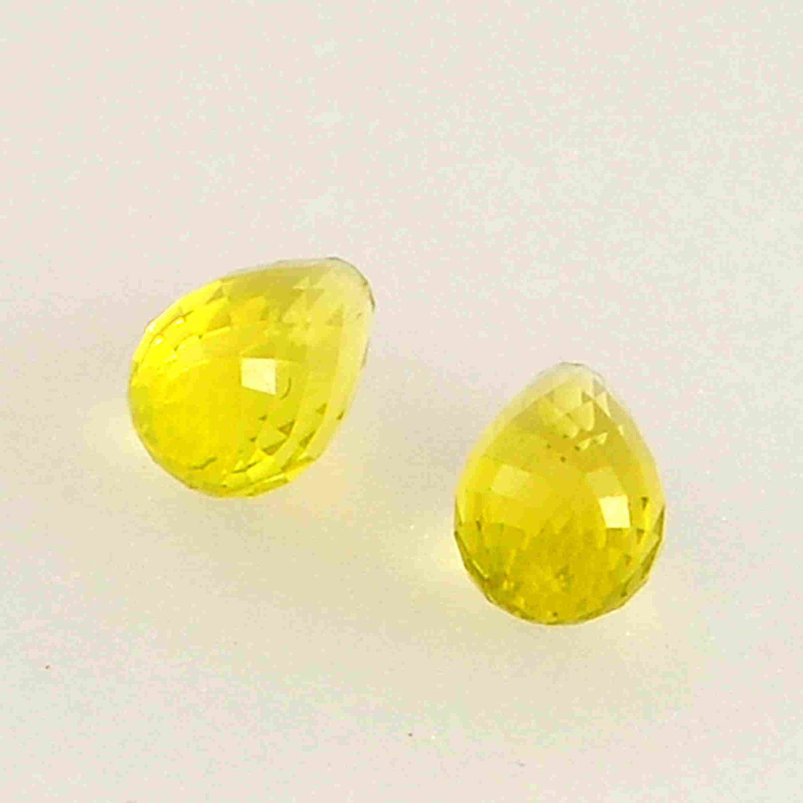 4.5 Carat Yellow Color Natural Drops Lemon Quartz Loose: No Reserve! Title: 4.5 Carat Yellow Color Natural Drops Lemon Quartz Loose Gemstone 2 Pieces Brand: Gems Trading Center Gemstones: Lemon Quartz Carat Weights: 4.5 Size/Dimensions: 6H x 9L x 6W mm Ship