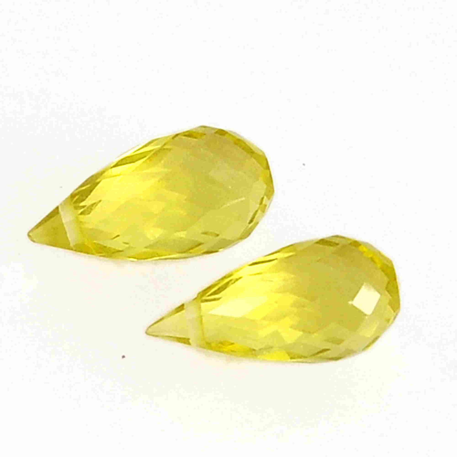 3.7 Carat Yellow Color Natural Drops Lemon Quartz Loose: No Reserve! Title: 3.7 Carat Yellow Color Natural Drops Lemon Quartz Loose Gemstone 2 Pieces Brand: Gems Trading Center Gemstones: Lemon Quartz Carat Weights: 3.7 Size/Dimensions: 5H x 11L x 5W mm Shi