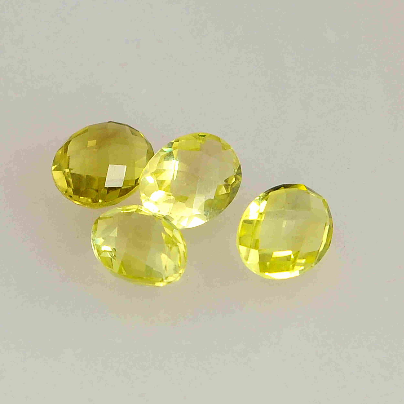 6.5 Carat Yellow Color Natural Oval Lemon Quartz Loose: No Reserve! Title: 6.5 Carat Yellow Color Natural Oval Lemon Quartz Loose Gemstone 4 Pieces Brand: Gems Trading Center Gemstones: Lemon Quartz Carat Weights: 6.5 Size/Dimensions: 4.5H x 9L x 7W mm Shi