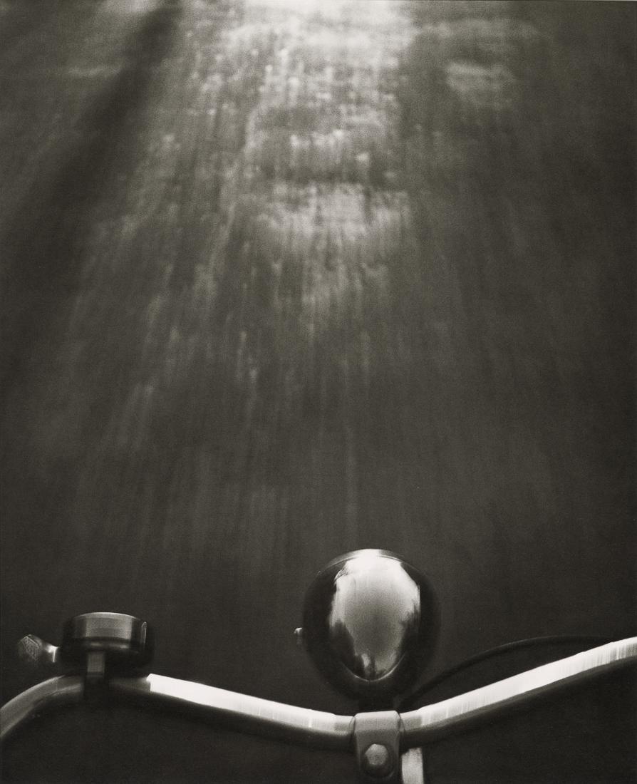 RENE GROEBLI - Free-Hand Cycling, 1946: Artist: Rene Groebli Title: Free-Hand Cycling, 1946 Medium: Photo Litho, 2015, Germany Dimensions: 9.25x11.4" Description: Heat Wax Mounted on 12x16" Conservation Board Artist Bio: Rene Groebli (b. 19