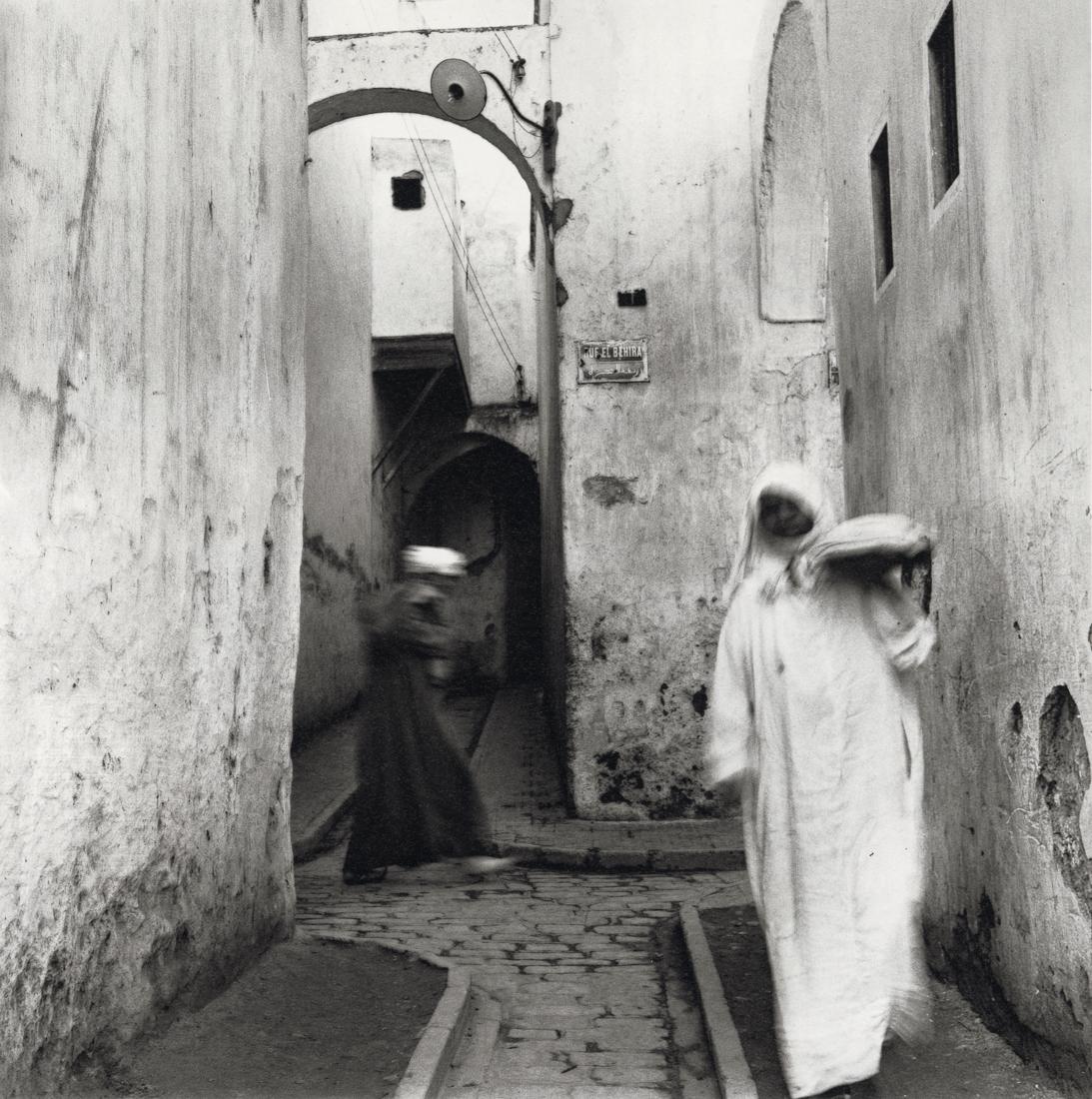 IRVING PENN - Street Scene, Morocco, 1951: Artist: Irving Penn Title: Street Scene, Morocco, 1951 Medium: Photo Litho, 1991, USA Dimensions: 8.7x8.75" Description: Heat Wax Mounted on 11x14" Conservation Board Artist Bio: Irving Penn (1917-200