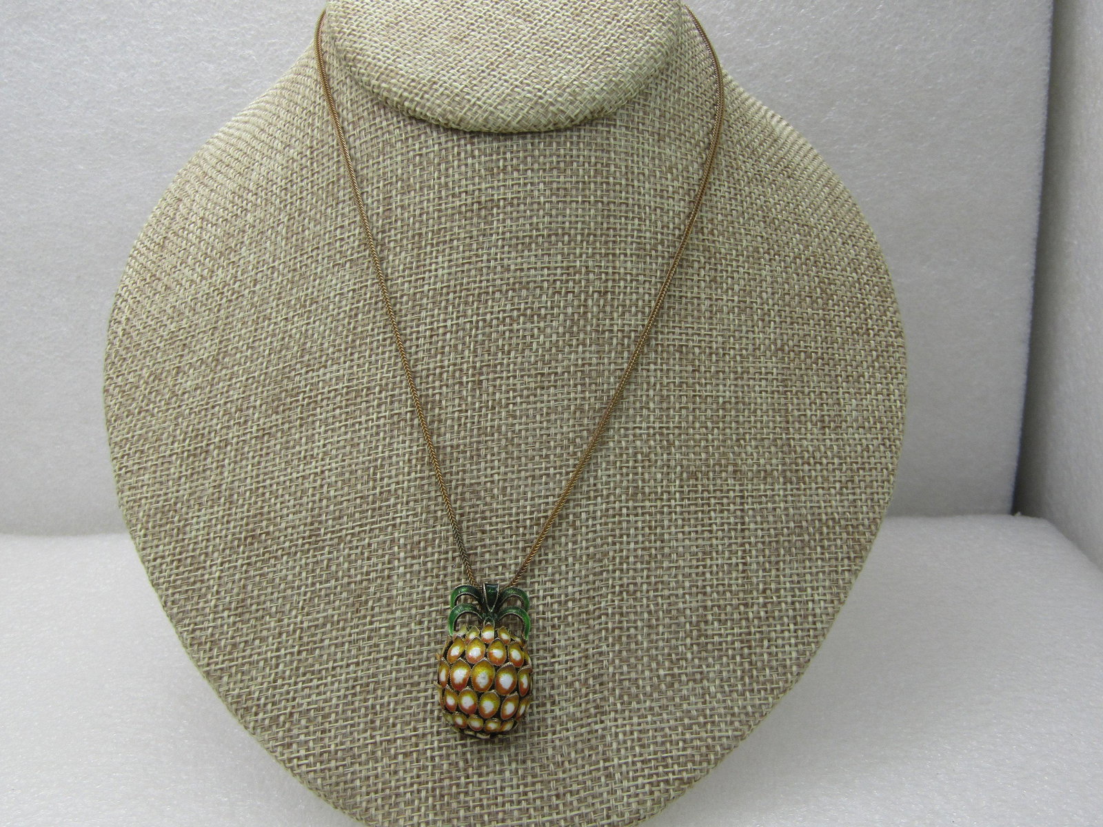 Vintage Sterling Champleve Pineapple Necklace, 16": Vintage Sterling Champleve Pineapple Necklace, 16" Wheat Link Chain, appx. 2mm wide. The pineapple is in golden, white and green champleve design with a 3-D look. It is marked .925 with gold over. Ver