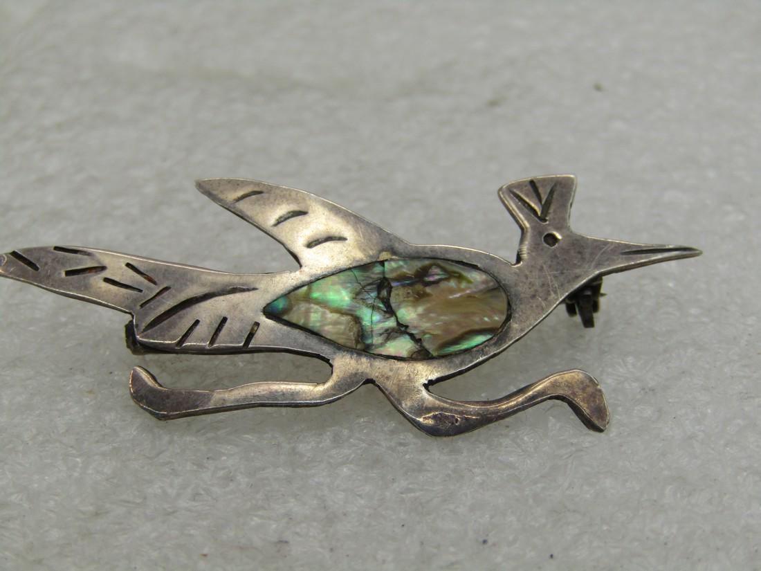 Vintage Sterling Abalone Roadrunner Brooch, Taxco,: Vintage Sterling Abalone Roadrunner Brooch, Taxco, Mexico. Appx. 1-7/8" wide and 7/8" tall with an inlaid abalone torso. Signed .925, Taxco and marked at the tail with the maker's mark. 1940's-1950's.