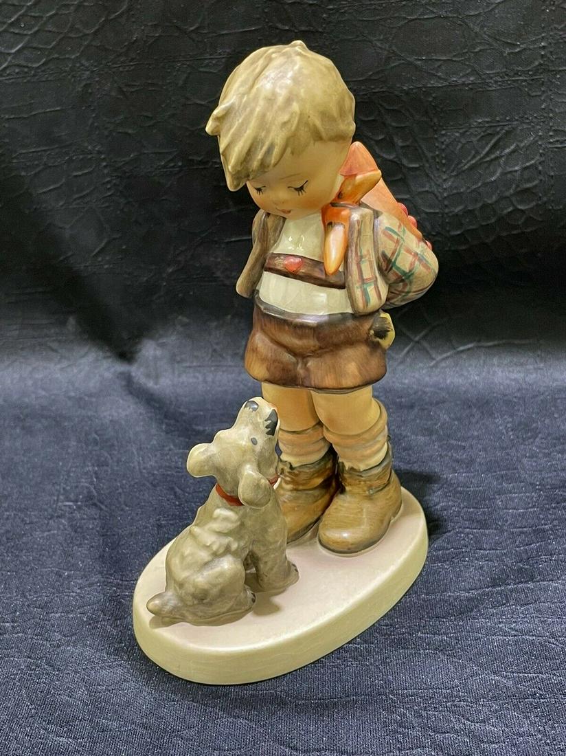 Goebel W. Hummel figure statue Boy with a dog porcelain: Title: Goebel W. Hummel figure statue Boy with a dog porcelain Date/Period: 20 century Materials: Porcelain Dimensions: 5.5 inch Description:A Goebel W. Germany Hummel figurine The boy with a dog is i