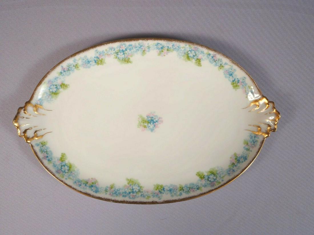 Limoges France Blue CHField Haviland GDA Oval Serving: This is rare and gorgeous 1 (one) Serving Platter. The platter was made in Limoges, France by GDA Haviland . The pattern features blue flowers probably forget-me-not. It has a gold rim. The platter is