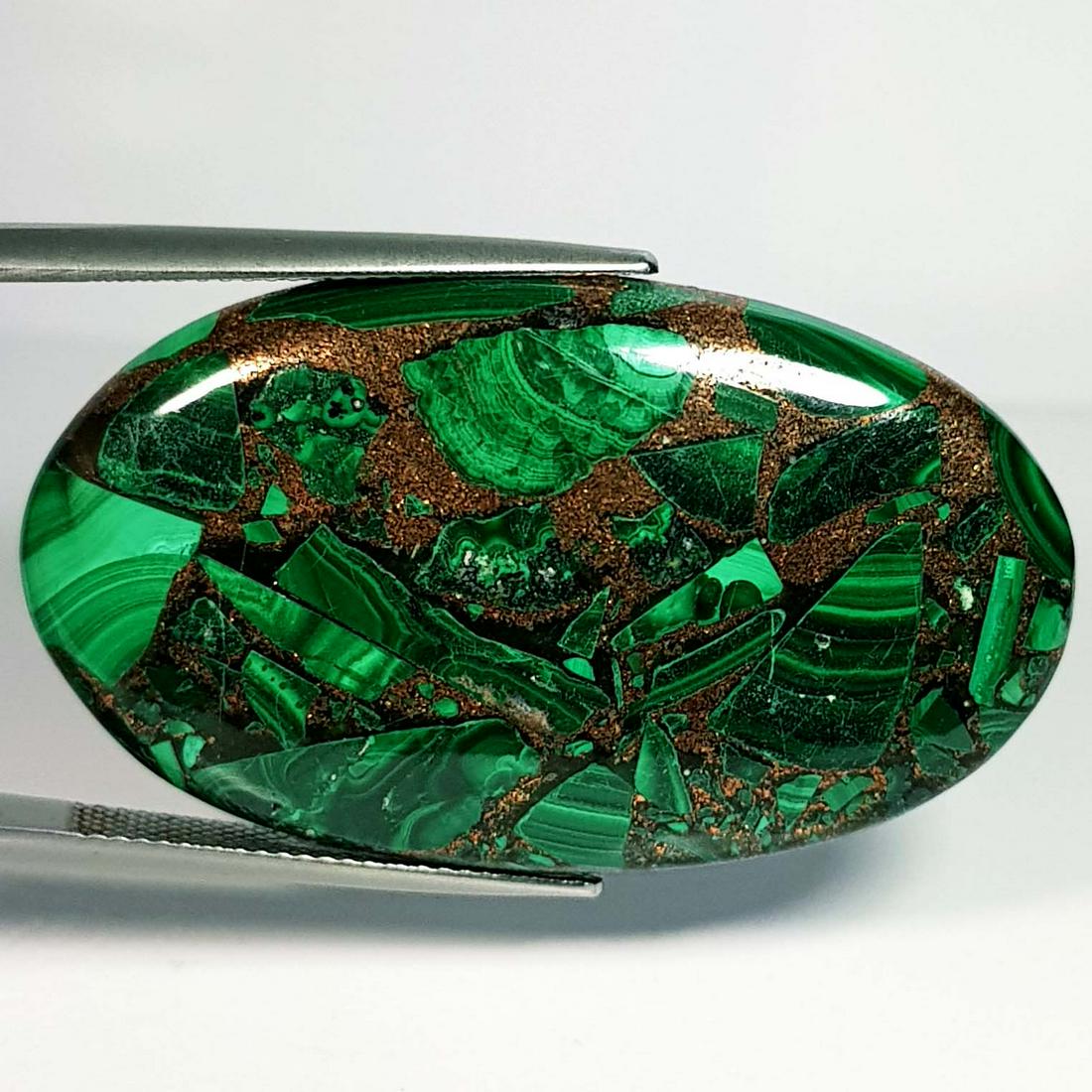 52.54 ct Natural Copper Malachite: No Reserve! Title: 52.54 ct Natural Copper Malachite Color/Clarity: Opaque Carat Weight: 52.54 Size/Dimensions: 41.85 x 24.50 x 5.50 Additional Information: Oval - USA/Egypt Shipping: Domestic: Flat-