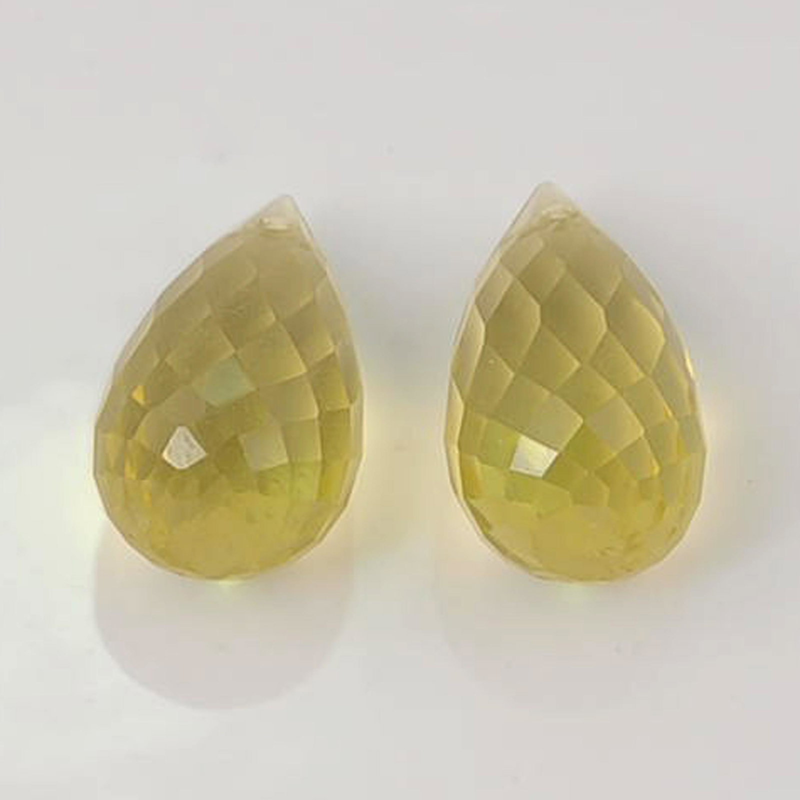 7.75 Carat Yellow Color Natural Drop Lemon Quartz Loose: No Reserve! Title: 7.75 Carat Yellow Color Natural Drop Lemon Quartz Loose Gemstone 2 Pieces Additional Information: Specification of Gemstone Name : Lemon Quartz Color : Yellow Total Weight : 7.75 Ca