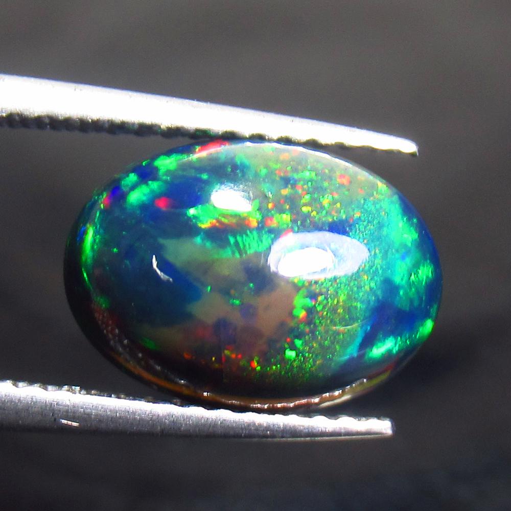 2.31 Ct Natural Ethiopian Black Fire Opal Oval Cab (1 of 2)