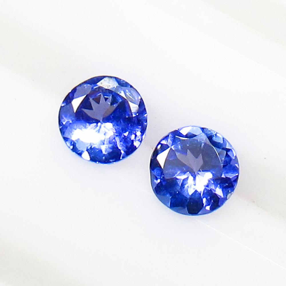 0.81 Ctw Natural Tanzanite Round Pair: Title: 0.81 Ctw Natural Tanzanite Round Pair Stone Clarity: VVS Gemstones: Tanzanite Carat Weights: 0.81 Size/Dimensions: 5.00 x 5.00 x 2.70 mm / 2 Pc's Additional Information: Top Class Luster / Exce