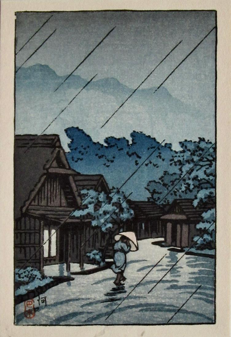 Hasui: Kawaguchi, Village in the Rain: Artist: HASUI Kawase; Subject: Kawaguchi, Village in the Rain; Publisher: Watanabe; Seal: Hasui; Date: 1930s; Format: koban, 10 x 14.4 cm; Condition: Fine impression, color and condition; Reserve: $20