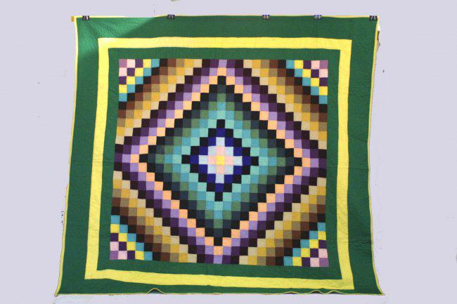 An early 20th century Ohio Mennonite quilt in the: Title: An early 20th century Ohio Mennonite quilt in the sunshine and shadow pattern Provenance/Additional Info: An early 20th century Ohio Mennonite quilt in the sunshine and shadow pattern - c. 1910
